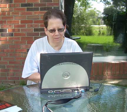 Sheryl outside with laptop